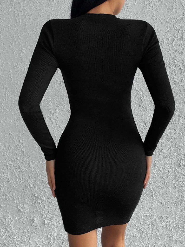 Robe pull noire fendue