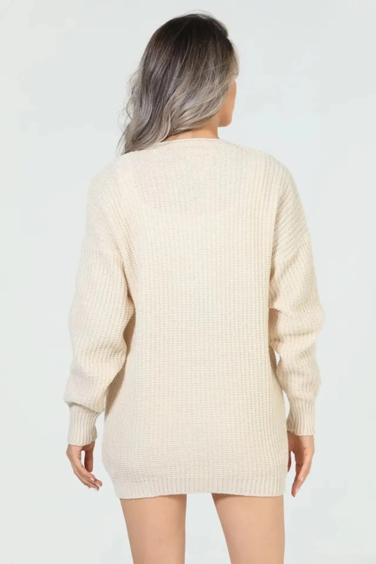 606 - Cardigan tricot brodé