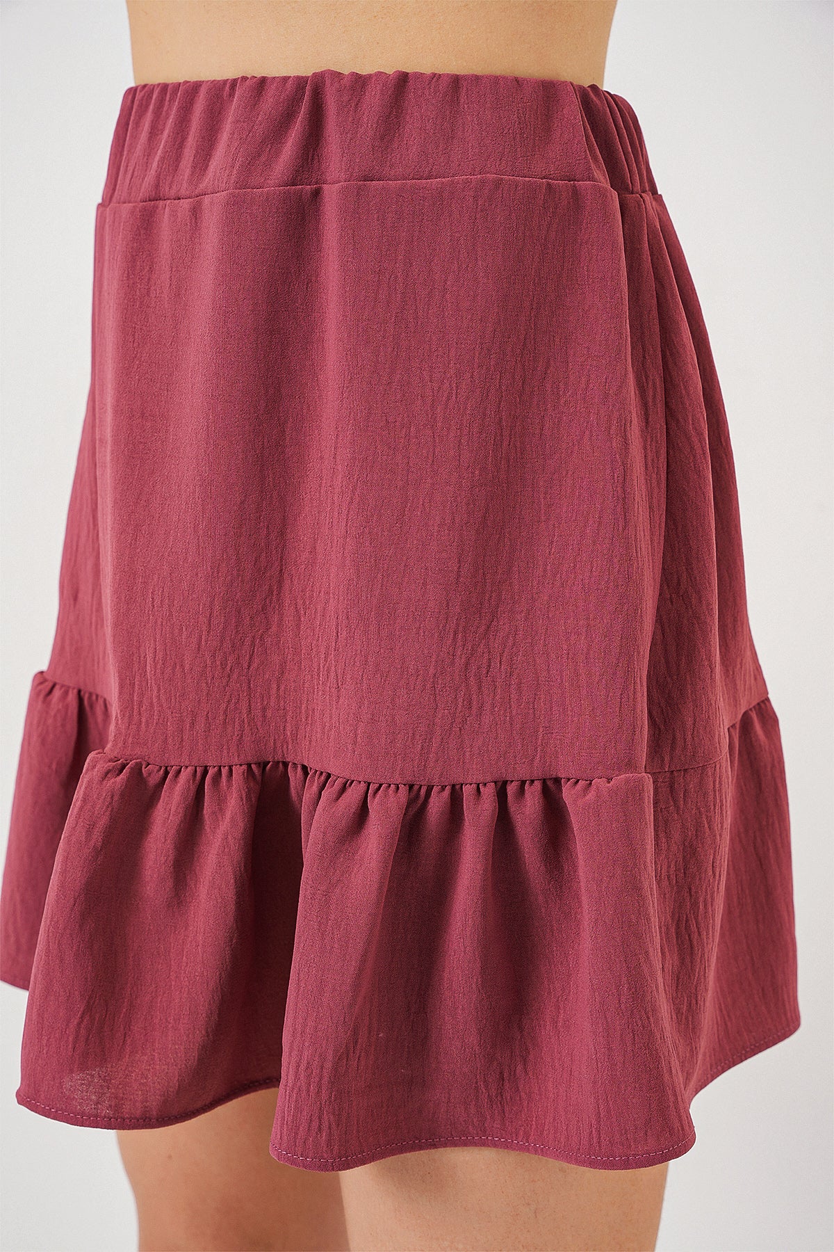 612 - Jupe mauve courte