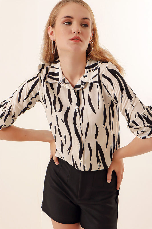 Chemise zébrée noire et beige