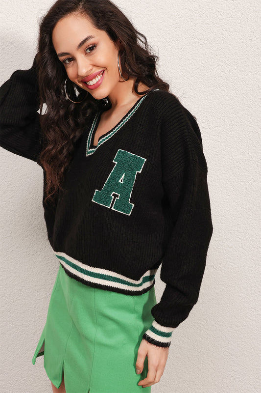 Pull noir et vert