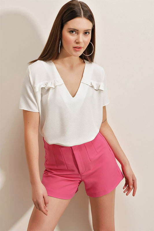 Blouse blanche à volants