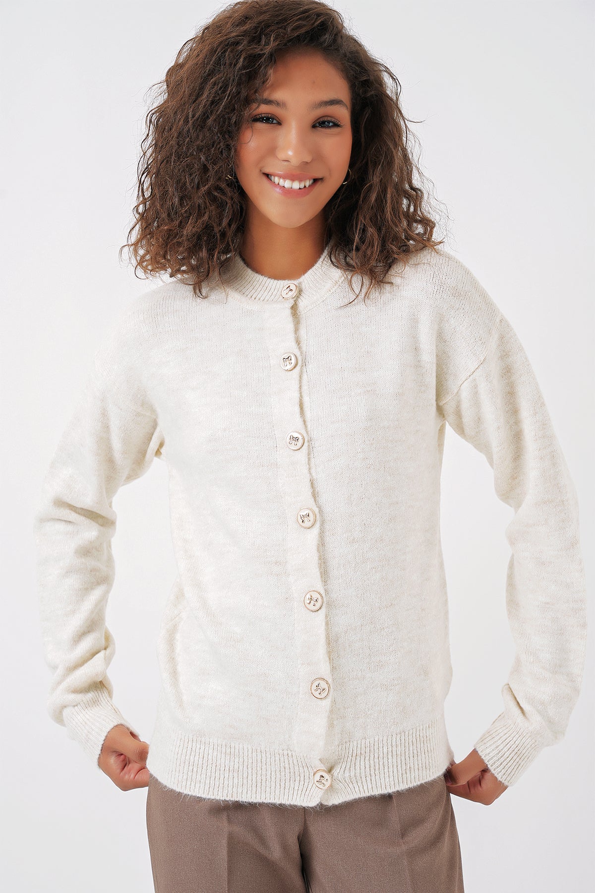 540 - Gilet boutonné écrue