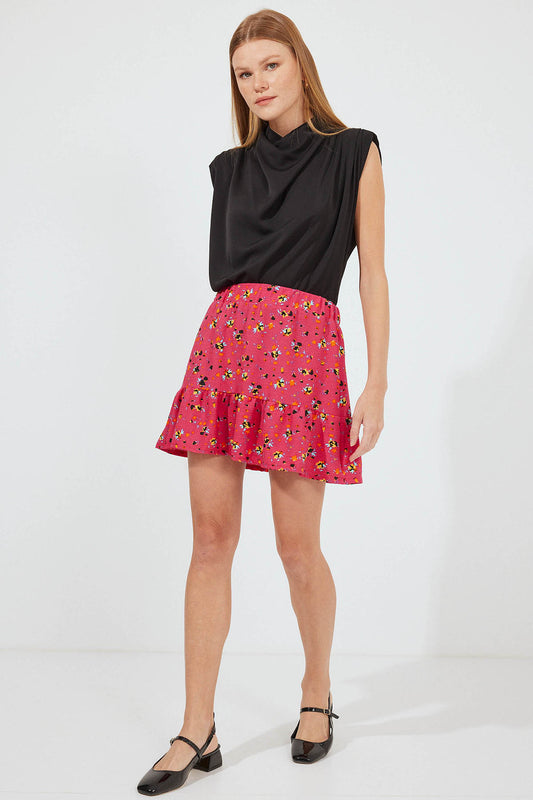 542 - Mini-jupe rouge à motifs