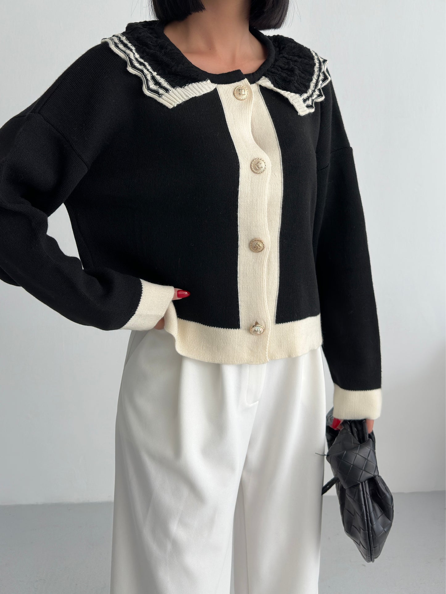 639 - Gilet noir et beige