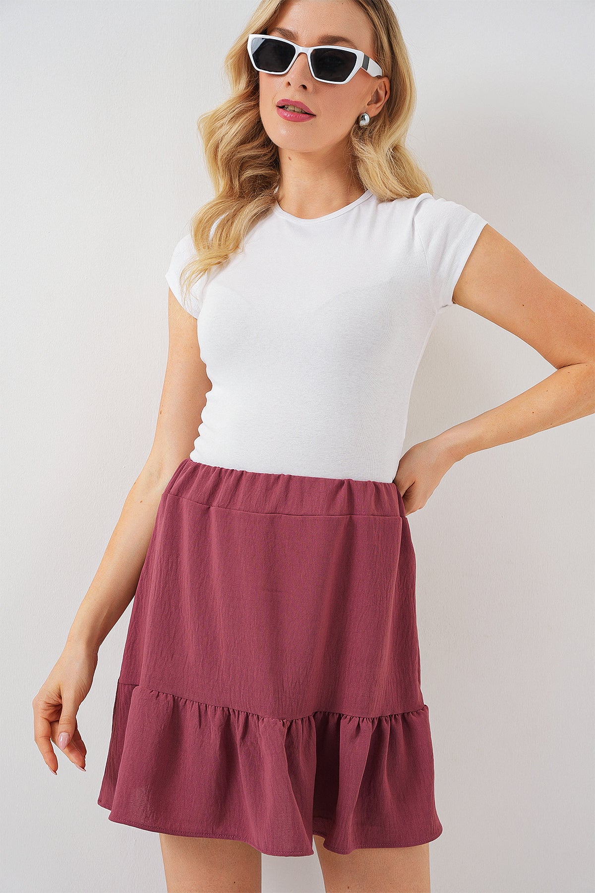 612 - Jupe mauve courte